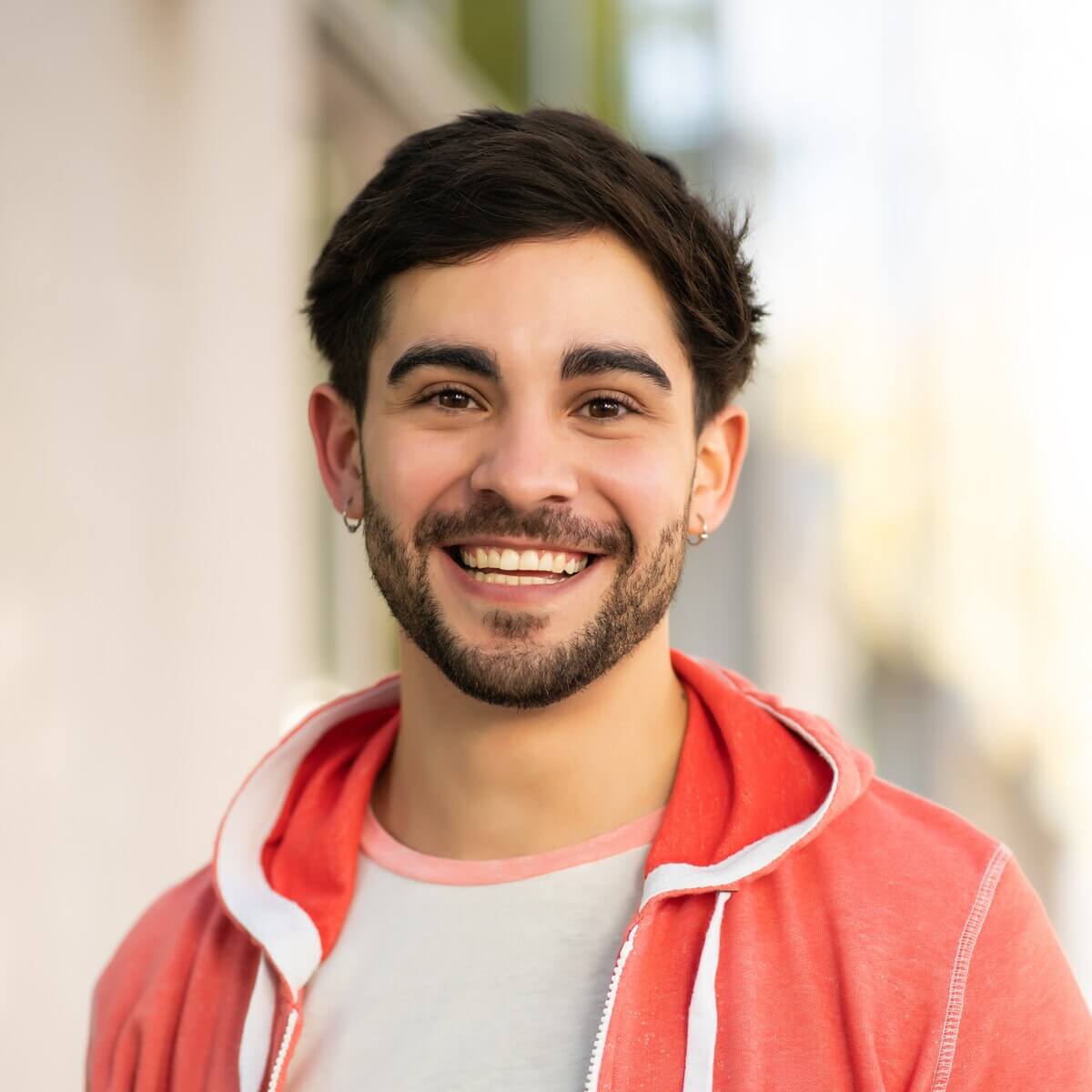 close up of young man smiling outdoors delex88.jpg